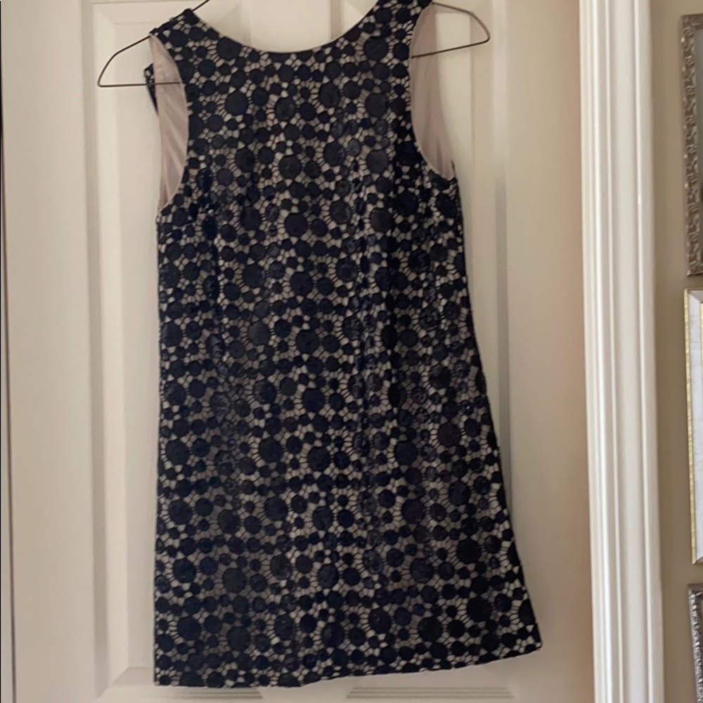 black sparkly and tan dress